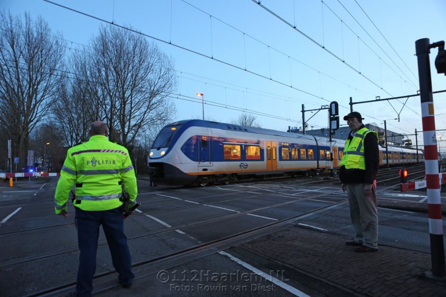Storing bij spoorwegovergang aan de Westergracht in Haarlem
